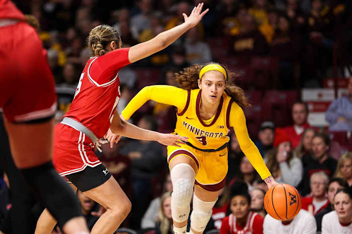 Feb 20, 2024; Minneapolis, Minnesota, USA; Minnesota Golden Gophers forward Ayianna Johnson (1) works around Wisconsin Badgers guard Sania Copeland (15) during the first half at Williams Arena.